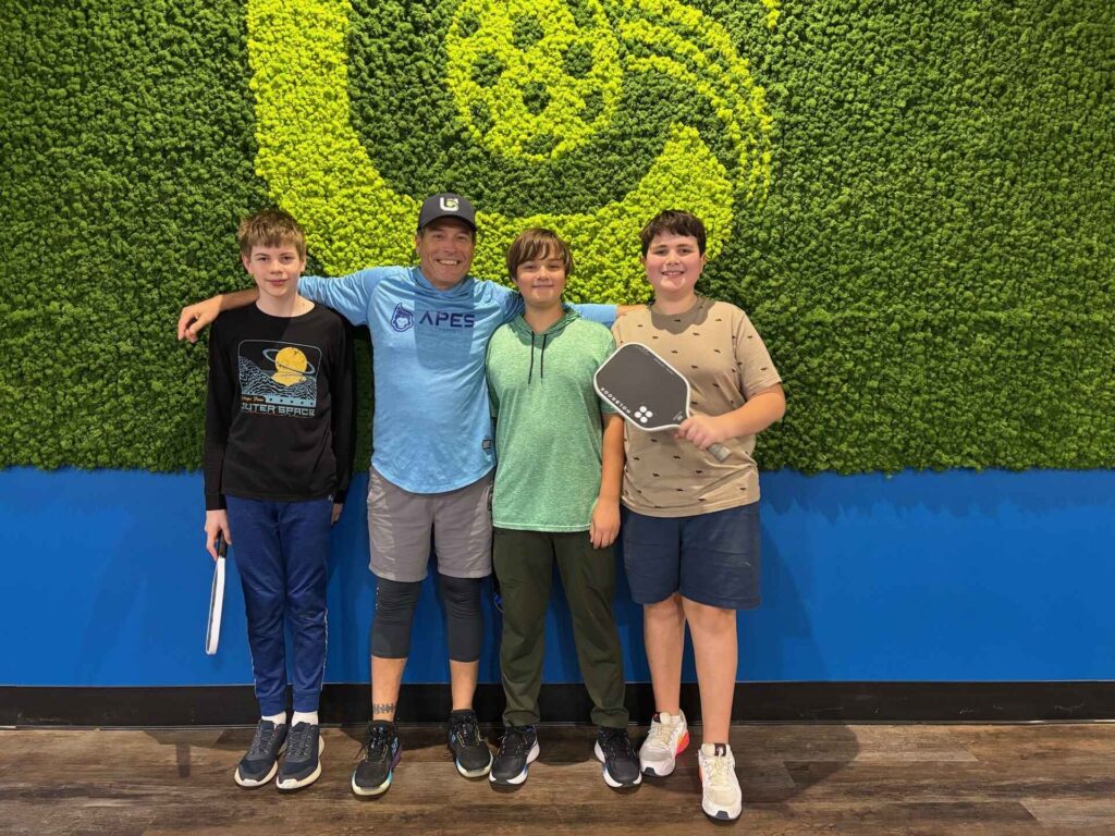 People having fun at indoor pickleball near Wocester